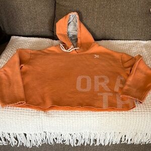 Gently loved Cozy Boxy Crop Top Hooded Sweatshirt by Orange Theory..